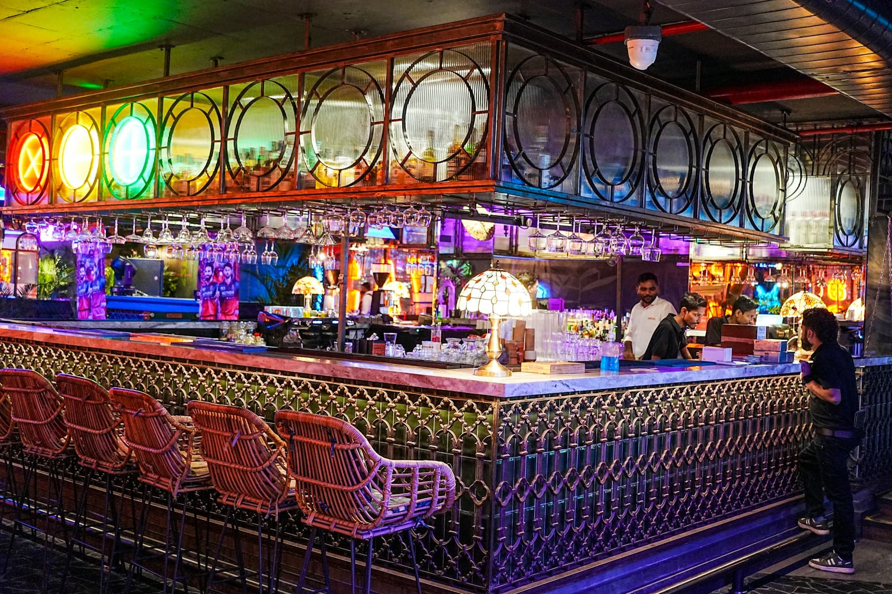 Vibrant upscale nightlife interior with colorful ambient lighting