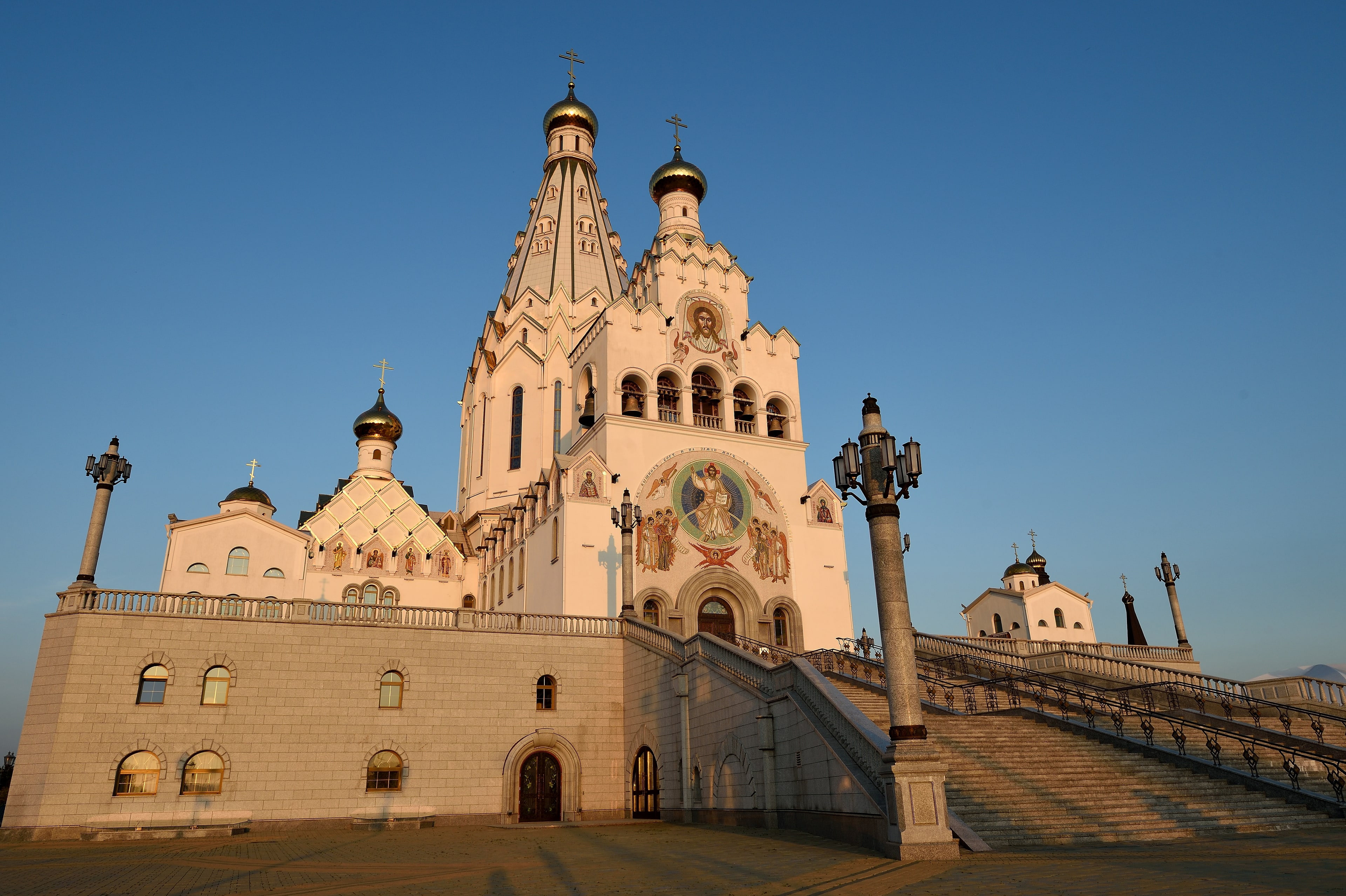 Golden-domed exterior of All Saints Memorial Church in Minsk